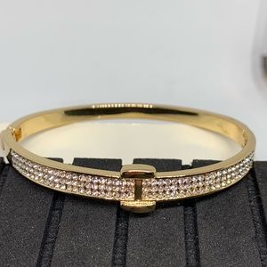 Gold cubic zirconium hinge bracelet